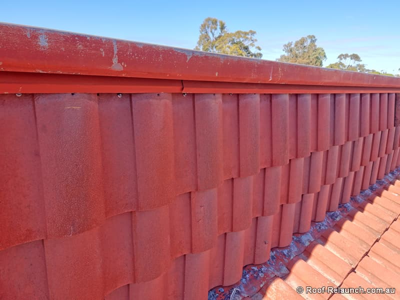 Repaired vertical part of tile roof