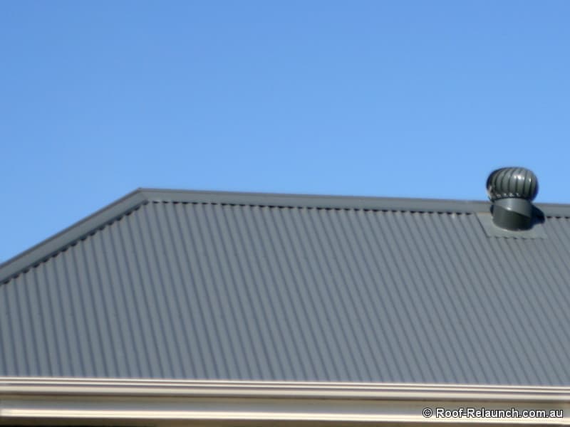 Closeup of new Colourbond metal roof, ventilator and gutter on South Australian home