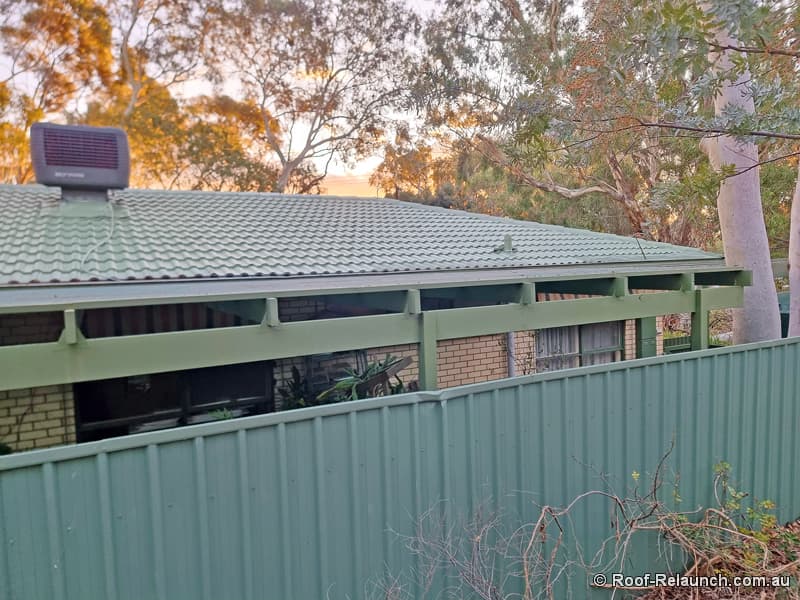 House with repaired tile roof and verandah